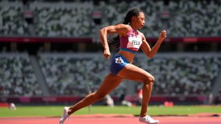 FILE – Allyson Felix, of United States races in a heat of the women’s 400 meters at the 2020 Summer Olympics, Aug. 3, 2021, in Tokyo, Japan. Felix says she will retire after the 2022 season. (AP Photo/Martin Meissner, File)