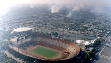 LOS ANGELES, CA - APRIL 30: Smoke fills the skies above the Los Angeles Memorial coliseum as arson fires burned on Thursday, April 30, 1992. Major Los Angeles-area sports events were canceled, postponed or relocated due to rioting and violence. (Photo by Myung Chun/Los Angeles Daily News via Getty Images)