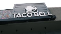 A Taco Bell restaurant stands along a Queens street on July 21, 2021 in New York City