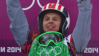 Trevor Jacob celebrates after the Men's Snowboard Cross Small Final on day eleven of the 2014 Winter Olympics on Feb. 18, 2014. Jacob, who is also a YouTuber, parachuted from an airplane in California last year after claiming engine trouble. The Federal Aviation Administration said that he purposely caused the aircraft to crash so he could record it.