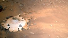 This image of the backshell and supersonic parachute of NASA’s Perseverance rover was captured by the agency’s Ingenuity Mars Helicopter during its 26th flight on Mars on April 19, 2022.