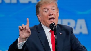 President Donald Trump gestures as he addresses the 148th National Rifle Association (NRA) annual meeting in Indianapolis, Indiana, April 26, 2019.