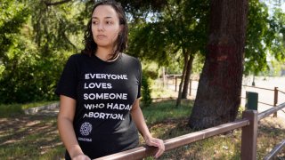 Jessica Pinckney poses at a park near her office in Oakland, Calif