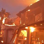 A home burns in the Coastal Fire in Laguna NIguel.