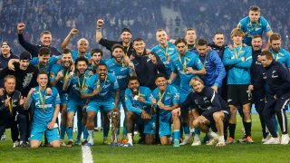 Zenit players and staff celebrate with the championship trophy and medals after the Russian Premier League match between FC Zenit Saint Petersburg and FC Lokomotiv Moscow on April 30, 2022 at Gazprom Arena in Saint Petersburg, Russia.