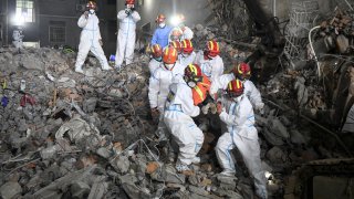 China building collapse survivor rescue efforts