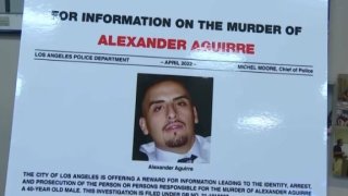 Alexander Aguirre, killed in a 2021 shooting in Sylmar, is pictured in a reward for information poster.