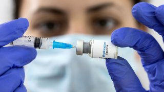 Mock-up vials labeled “Monkeypox vaccine” are seen in this illustration taken, May 25, 2022.