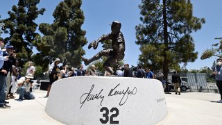 Los Angeles Dodgers unveil the Sandy Koufax statue in the Centerfield Plaza to honor the Hall of Famer and three-time Cy Young Award winner.