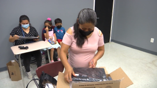 Latino parents in LA County received laptops to participate in a six-week digital literacy program.