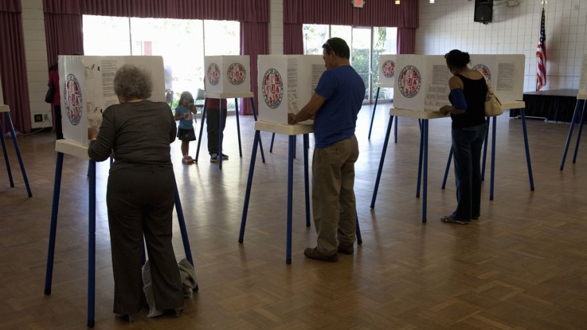 VENTURA COUNTRY, CA – NOVEMBER 06: Voters at polling station in 2012 Presidential Election on November 06, 2012 Ventura County, California