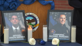 Photos of officers Joseph Santana and Michael Paredes are pictured.