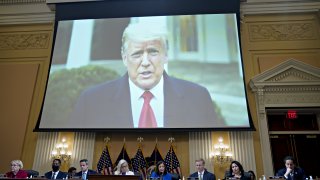 Former US President Donald Trump displayed on a screen during a hearing of the Select Committee to Investigate the January 6th Attack on the US Capitol in Washington, D.C., US, on Thursday, July 21, 2022.