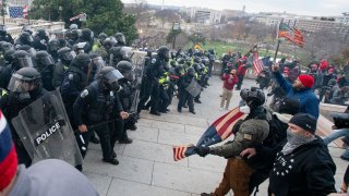 ioters face off with police at the U.S. Capitol on Jan. 6, 2021