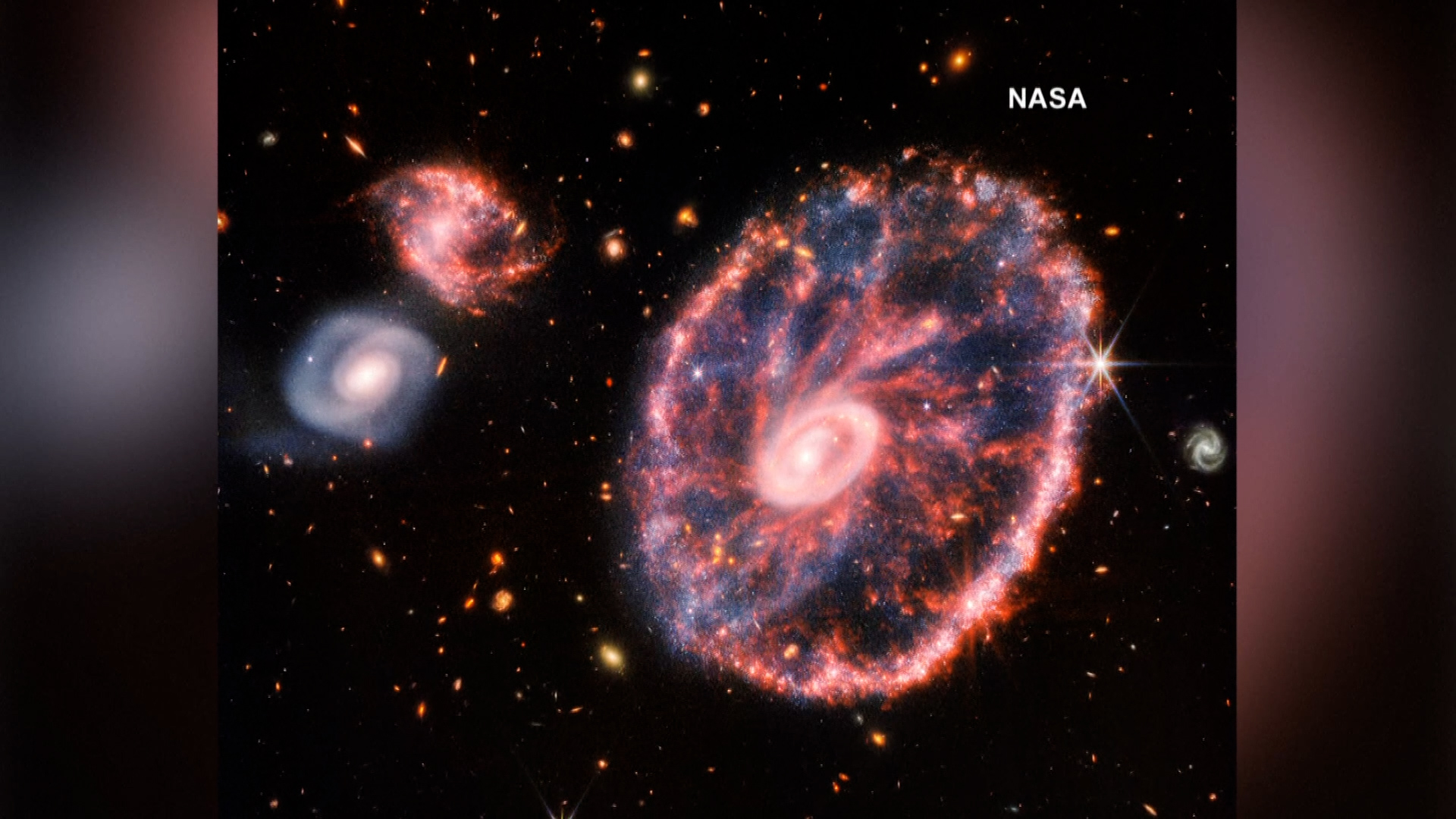 New NASA Pictures Reveal Rare Cartwheel Galaxy image photo