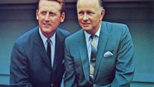 Portrait of American sportscasters Vin Scully (left) and Jerry Doggett (1916 - 1997) as they pose together in Dodger Stadium, Los Angeles, 1960. (Photo by Transcendental Graphics/Getty Images)