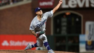Julio Urías strikes out 12 while the Dodgers rout the Rockies 8-3
