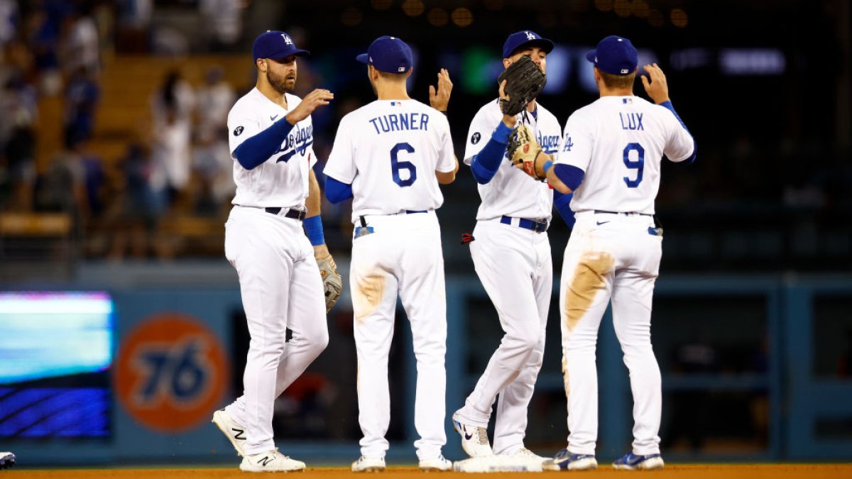Dodgers' 12-game win streak ends; Singer, Royals blank LA
