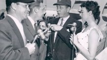 UNSPECIFIED - 1955: Marty Glickman, Ward Wilson, Vin Scully and "Gorgeous" Gussie Moran photographed during an interview in September 1955. (Photo by United Press Association/Sports Studio Photos/Getty Images)