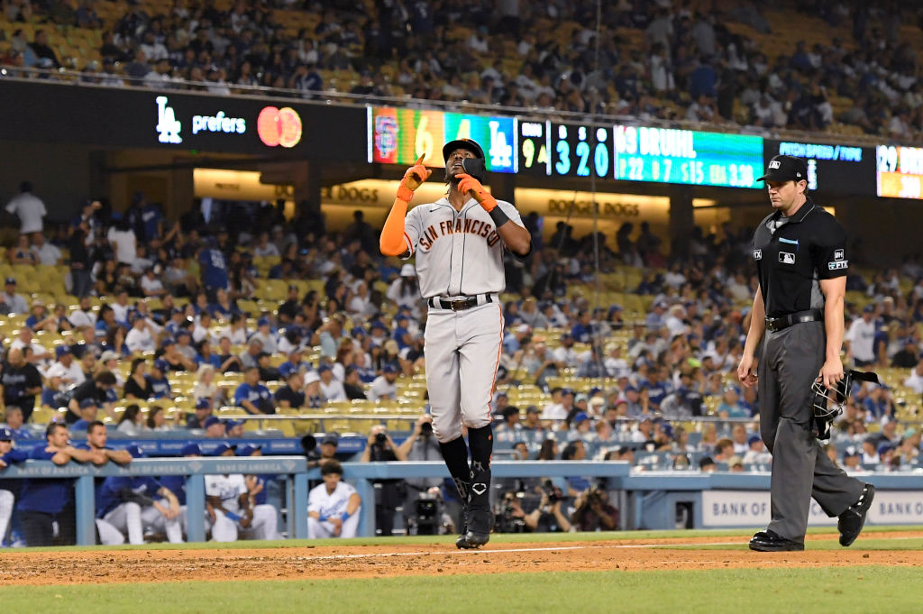 Wilmer Flores of the San Francisco Giants hits a solo home run during  News Photo - Getty Images