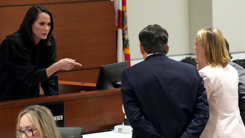 Judge Elizabeth Scherer speaks with Assistant State Attorney Jeff Marcus, Assistant Public Defender Melisa McNeill and capital defense attorney Casey Secor during the penalty phase of the trial of Marjory Stoneman Douglas High School shooter Nikolas Cruz at the Broward County Courthouse in Fort Lauderdale on Wednesday, August 31, 2022.