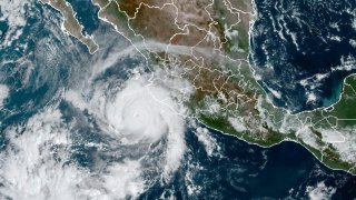 This satellite image taken at 15:30 UTC and provided by NOAA shows Hurricane Roslyn approaching the Pacific coast of Mexico, Saturday, Oct. 22, 2022.