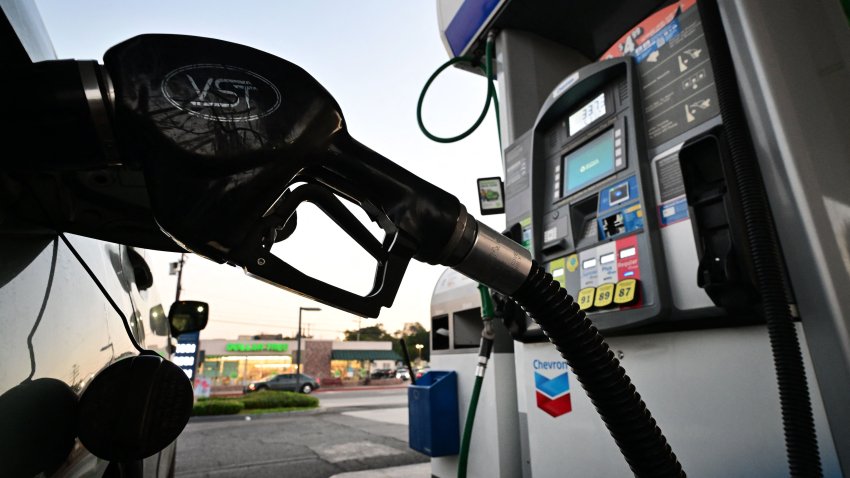 A nozzle pumps gasoline into a vehicle at a gas station in Los Angeles, California on October 5, 2022. – Saudi Arabia, Russia and other top oil producers agreed on a major cut in production on Wednesday to boost crude prices — a move denounced by the United States as a concession to Moscow that will further hurt the global economy. US gas prices have already been trending higher in recent weeks and California gas prices are approaching record highs again. (Photo by Frederic J. BROWN / AFP) (Photo by FREDERIC J. BROWN/AFP via Getty Images)