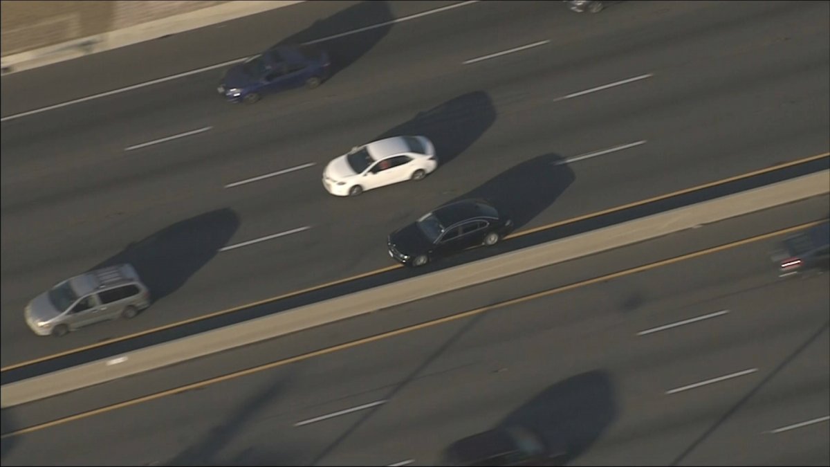 Watch Two Run Across Freeway After Crashing Bmw Into Big Rig Nbc Los