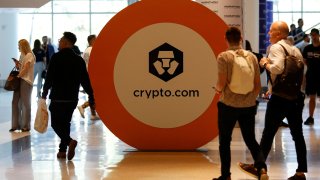 The logo of Crypto.com is seen at a stand during the Bitcoin Conference 2022 in Miami Beach, Florida, April 6, 2022.