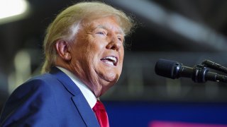 Former U.S. President Donald Trump speaks as he attends a rally in Warren, Michigan, October 1, 2022.