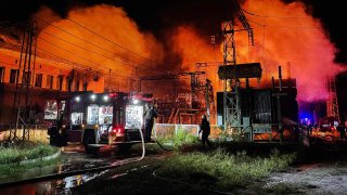 A fire engine stand in front of a burning electrical substation during extinguishing a fire on Sept. 11, 2022 in Kharkiv, Ukraine. Two people died after a rocket hit an electrical substation on the outskirts of Kharkiv. Explosions in the city rang out at 8:00 p.m. As a result of the impact of two Russian cruise missiles, the administrative building was destroyed, transformers caught fire. The entire city was completely blacked out for about four hours.
