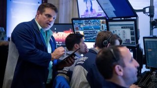 Traders work on the floor of the New York Stock Exchange NYSE in New York, the United States, on Nov. 2, 2022.