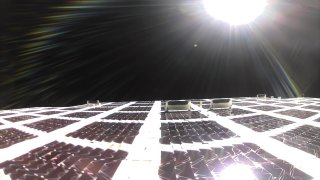 A view from onboard the satellite, captured after deploying the 693-square foot array.