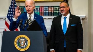 U.S. President Joe Biden delivers remarks regarding student loan debt forgiveness in the Roosevelt Room of the White House on Wednesday August 24, 2022. Education Secretary Miguel Cardona joined.