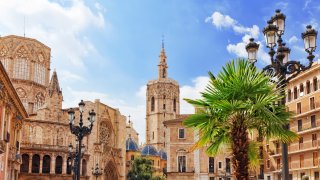 Square of Saint Mary’s and Valencia cathedral temple in old town Spain.