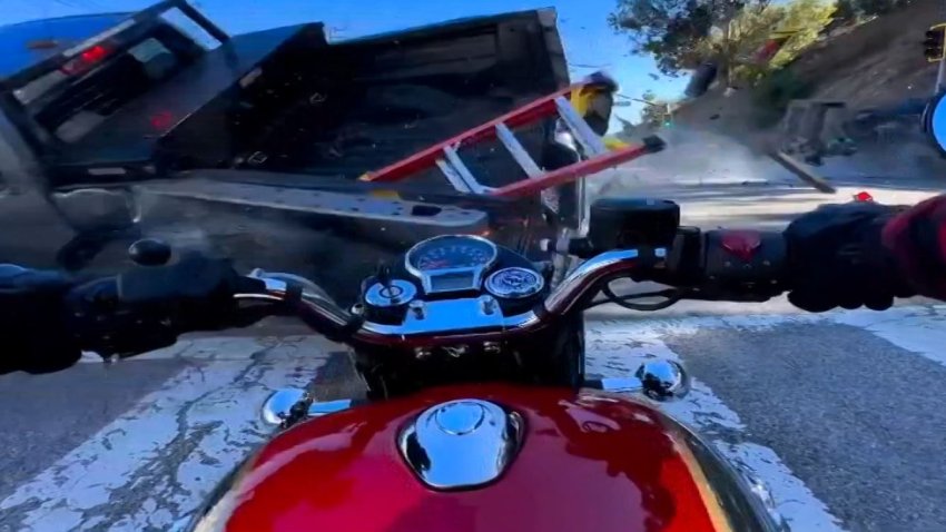 A motorcyclist's camera shows his point of view during a crash at a Malibu stoplight.