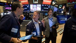 Traders work on the floor of the New York Stock Exchange (NYSE) in New York, US, on Wednesday, Nov. 9, 2022. 