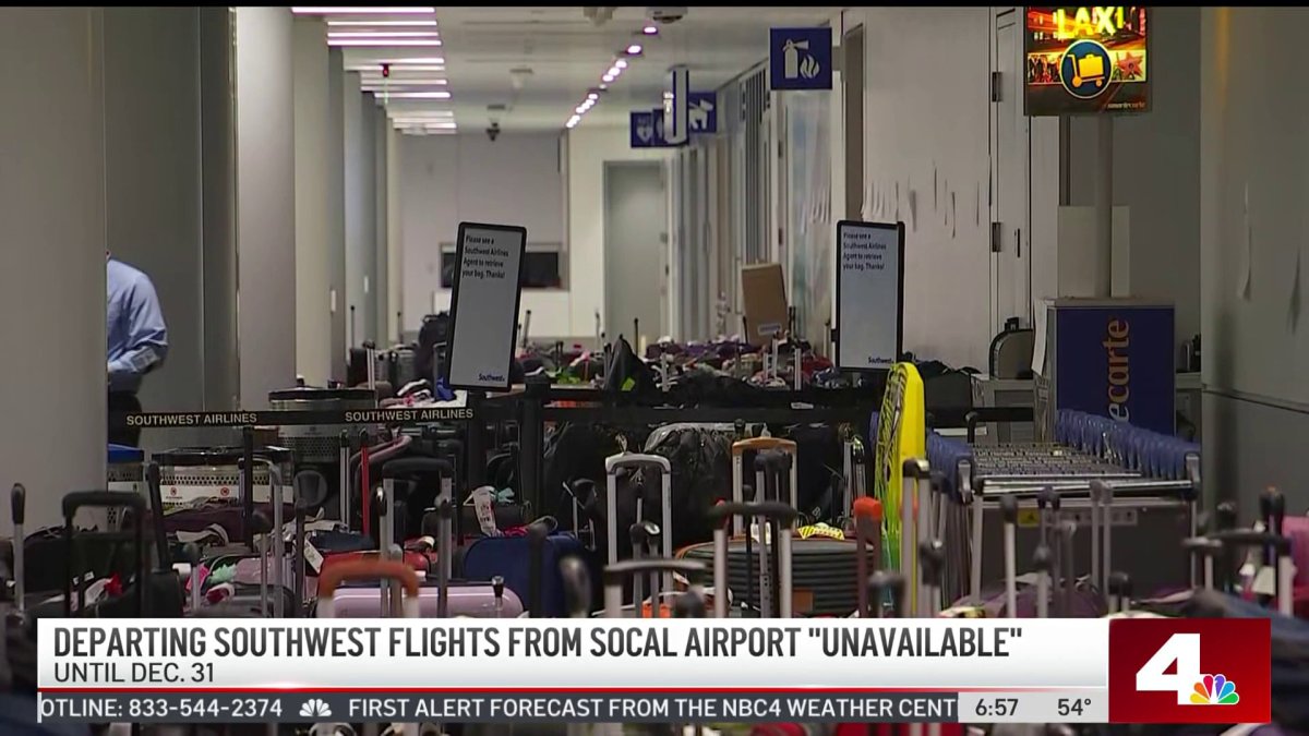 Live at LAX: Bags Pile Up at Terminal, as Stranded Travelers Try to
