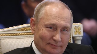 File - Russian President Vladimir Putin smiles during the SCTO Summit on Nov. 23, 2022, in Yerevan, Armenia.