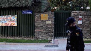 A Spanish policeman stands guard next to Ukraine’s embassy in Madrid on Dec. 2, 2022. – A number of Ukrainian diplomatic missions in the European Union have received packages containing animal eyes in what Kyiv described as a “well-planned campaign of terror."