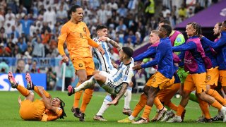 LUSAIL CITY, QATAR – DECEMBER 09: Virgil Van Dijk of Netherlands clashes with Leandro Paredes of Argentina during the FIFA World Cup Qatar 2022 quarter final match between Netherlands and Argentina at Lusail Stadium on December 09, 2022 in Lusail City, Qatar. (Photo by Matthias Hangst/Getty Images)