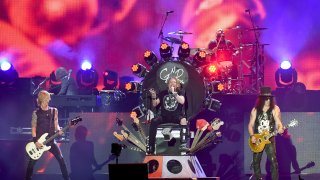 Michael “Duff” McKagan (left), Axl Rose (center) and Saul “Slash” Hudson (right)