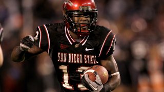 SAN DIEGO – NOVEMBER 20:  Running back Ronnie Hillman #13 of the San Deigo State Aztecs carries the ball on a five yard touchdown run in the second quarter against the Utah Utes at Qualcomm Stadium on November 20, 2010 in San Diego, California.  (Photo by Stephen Dunn/Getty Images)