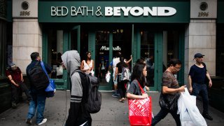 Shoppers enter a building housing a Bed Bath & Beyond Inc. store in New York.