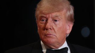 Former President Donald Trump arrives at his Mar-a-Lago home on Dec. 31, 2022.