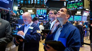 Traders on the floor of the New York Stock Exchange (NYSE) in New York, on Tuesday, Jan. 3, 2023.
