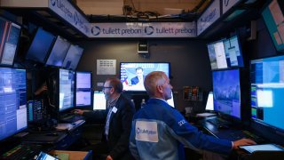 Traders work on the trading floor at the New York Stock Exchange (NYSE) in New York City, U.S., January 25, 2023.