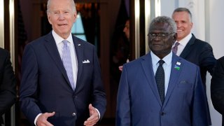 President Joe Biden speaks as he poses for photos with Pacific Island leaders, including Solomon Islands Prime Minister Manasseh Sogavare, right, on the North Portico of the White House in Washington, Thursday, Sept. 29, 2022.