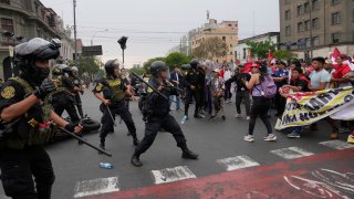 Anti-government protesters who traveled to the capital from across the country march against Peruvian President Dina Boluarte