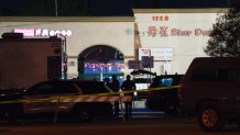 MONTEREY PARK, CA - JANUARY 22: Law enforcement at the scene of a shooting on January 22, 2023 in Monterey Park, California. Ten people have been shot dead during at a gathering celebrating the Chinese lunar new year. (Photo by Eric Thayer/Getty Images)